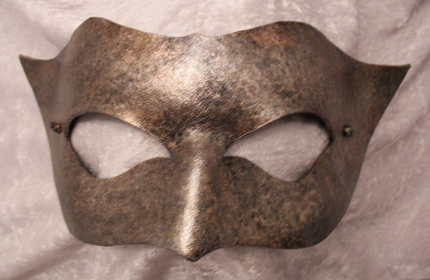 Silver demure knight mask.