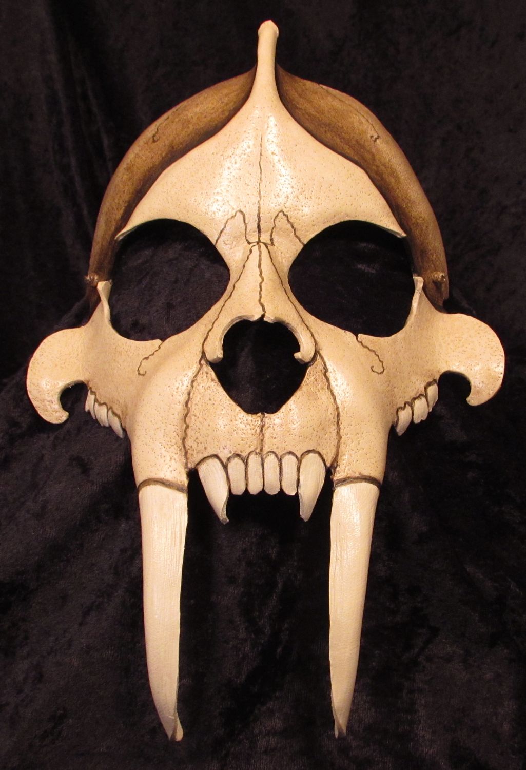 Saber tooth tiger skull mask.